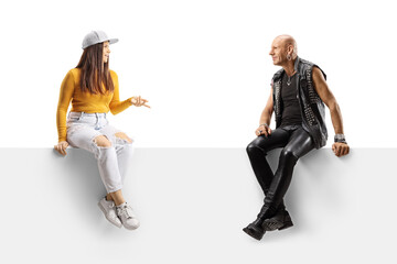 Punk listening a young casual female talking while sitting on a panel