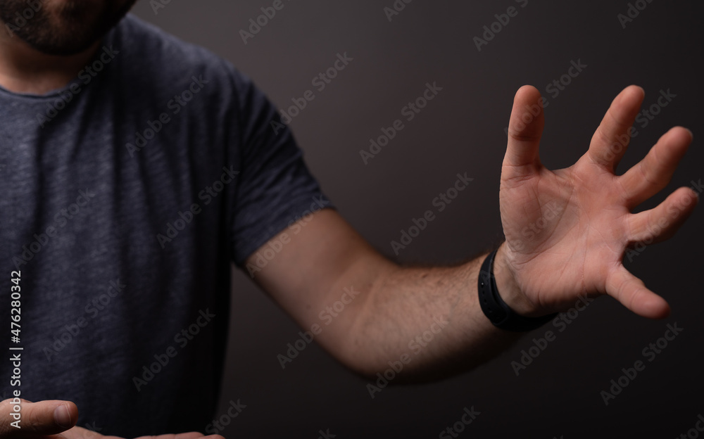 Poster man showing his empty hand.