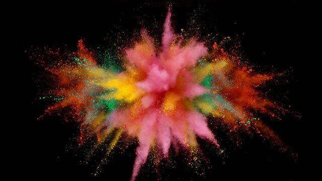 Super slow motion of colored powder explosion isolated on black background. Filmed on high speed cinema camera, 1000fps.