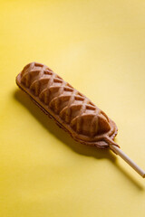 waffles sticks plains on yellow background. making patterns