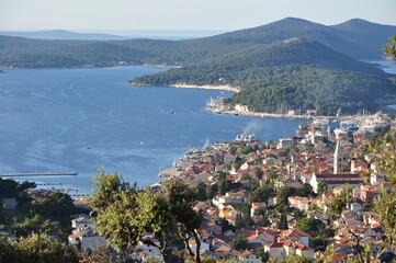 Obraz premium Panoramic view to the city and port of Mali Losinj. Island Losinj blue lagoon. Adriatic Sea.Buildings and houses.