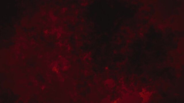 Slow zoom out of creepy ink stains on dark red backdrop. Animated horror background loop.