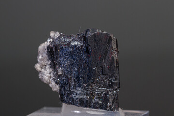 macro mineral Acanthite stone on a black background