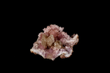 Macro mineral stone Pink Amethyst on a black background