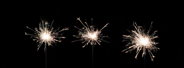 Several Sparklers isolated on a black background.