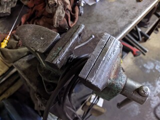 old vice in the garage closeup photo.