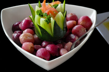 Plate with onion and cucumber