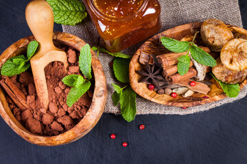 Homemade jam from figs, cocoa and spices - cinnamon, cardamom, tubby. Candy set. Sweet life.