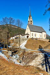 Church San Giuliana. Vigo di Fassa (Vich) in valley Val di Fassa in the Dolomites. Europe, Central...