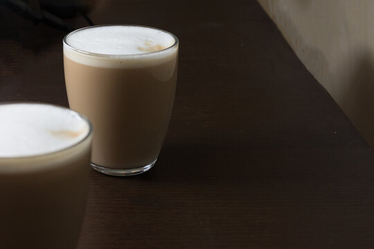 Two glasses of coffee with milk cappuccino or latte