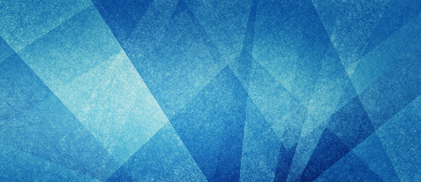 Abstract modern background in blue and white contemporary triangle and polygonal shapes layered in textured geometric art pattern with angles