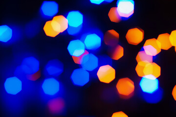 Blurred bokeh light background, Christmas and New Year holidays background.