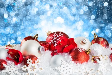 Fototapeta na wymiar Festively Decor for Christmas tree on blurred sparkling fairy background.