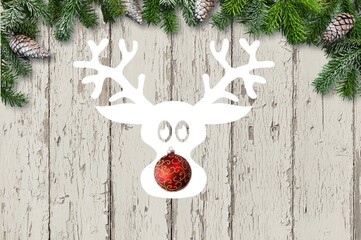 Christmas background concept. Funny Christmas deer and a red ball as a nose