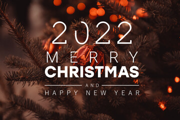 2022 Christmas and New years holiday web banner background. Template with Xmas balls, snow on fir tree and high lights.