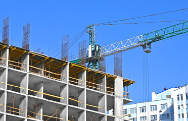 Crane and highrise construction site