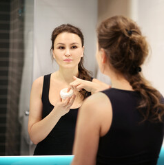 Applying the cream..Magic anti-aging cream.