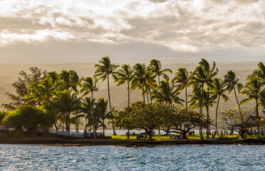 Naklejka premium Beautiful Liliuokalani Park and Gardens in Hilo, Hawaii, on a rainy sunset