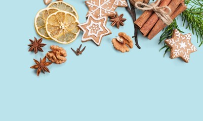 Collection of Christmas objects and cookies on the colored background