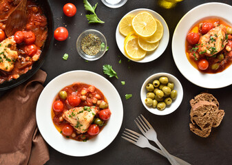 Cod stew with chickpeas, cherry tomatoes and olives
