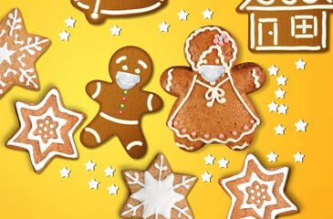 Happy New Year's set of the gingerbread man in face mask from ginger biscuits glazed sugar icing decoration