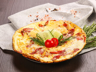 Tasty breakfast – omelet with meat