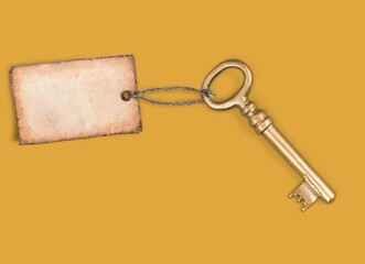 2021 New Year Key stock. Old decorative key with tag on the desk