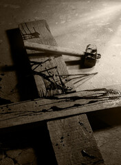 Blood drips on a wooden cross