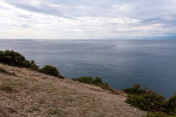 Crimean Black Sea coast, landscape sea, mountains and sky, the concept of travel and tourism on the Crimean peninsula