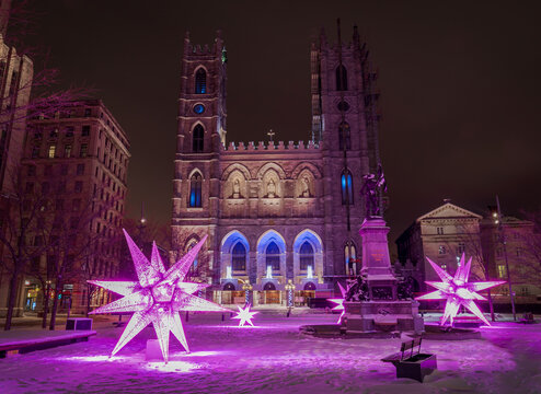 illuminated  winter festive Christmas decoration near Notre Dame Basilica