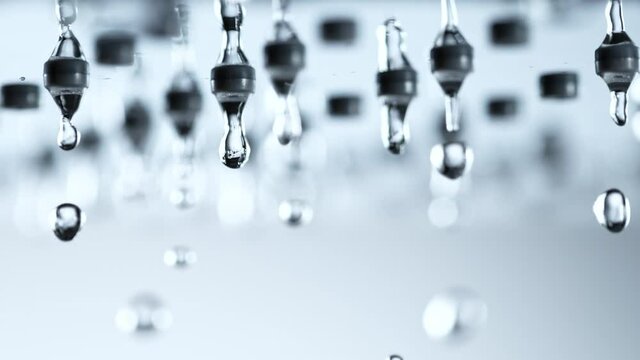 Super Slow Motion Shot of Water Droplets Falling From Shower Head at 1000fps.