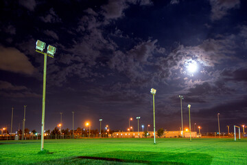 An empty ball field at nigt