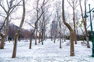 people are walking on snowy roads. winter landscape of Taksim, Istanbul 