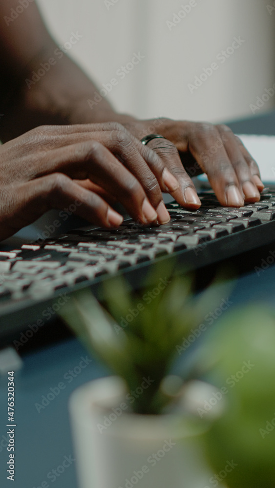 Poster close up of hands using computer keyboard and listening to music for business remote work. man danci
