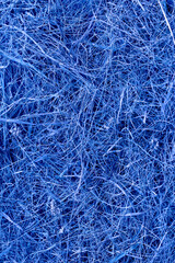 Hay background or texture, dried grass, toned in blue color