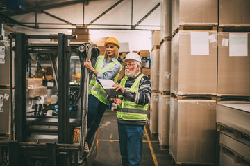 Group of workers working in a warehouse.