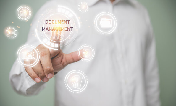 Document management, The future document management system, business, document storage system transformation, online business ideas, and technology. Businessman touching the virtual screen.