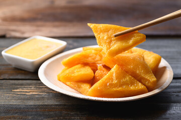 Deep fried Burmese tofu eating with spicy dipping sauce, Tai Yai food in Northern of Thailand