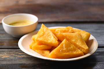 Deep fried Burmese tofu eating with spicy dipping sauce, Tai Yai food in Northern of Thailand