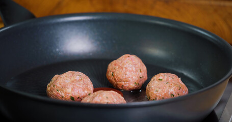 Close Up Shot Meatballs Frying on Hot Pan