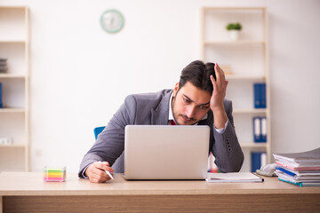 Young businessman employee working in the office