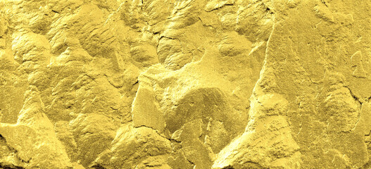 Gold grunge background. Gold stone background with copy space.