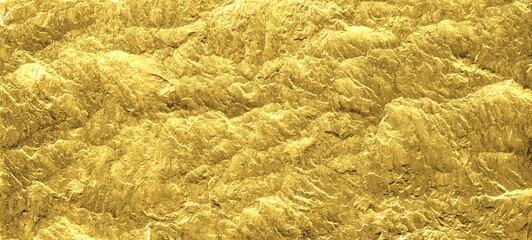 Gold grunge background. Gold stone background with copy space.
