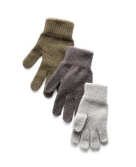 Different warm gloves isolated on white background