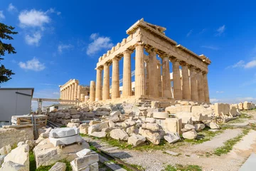 Fotobehang View of the Parthenon on Acropolis Hill in Athens, Greece with a deep blue sky behind. © Kirk Fisher