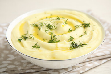 Freshly cooked homemade mashed potatoes on white table, closeup
