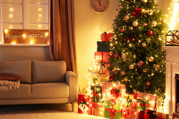 Stylish interior of living room with beautiful Christmas tree at night