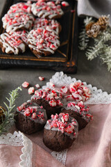 Tasty candy cane cookies on grey background