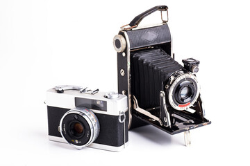 Two vintage analog cameras from different eras