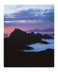sea of clouds in the mountains of south brazil during a pink sunrise